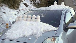 Illustration for article titled Recreate Your Favorite Calvin and Hobbes Comics With Tiny Snowman Molds